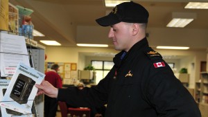 Military member grabbing deployment resource